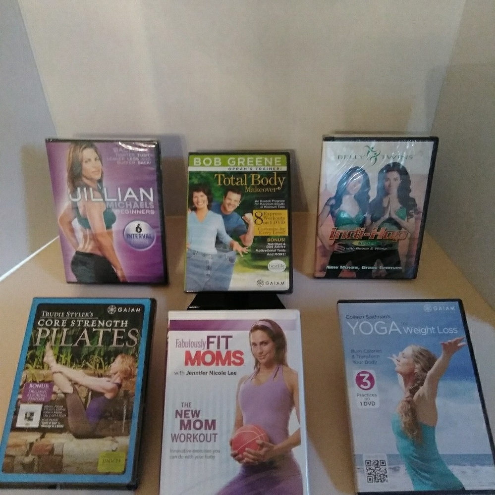 SET OF SIX "NEW" SEALED WORK OUT DVD'S ( $18)